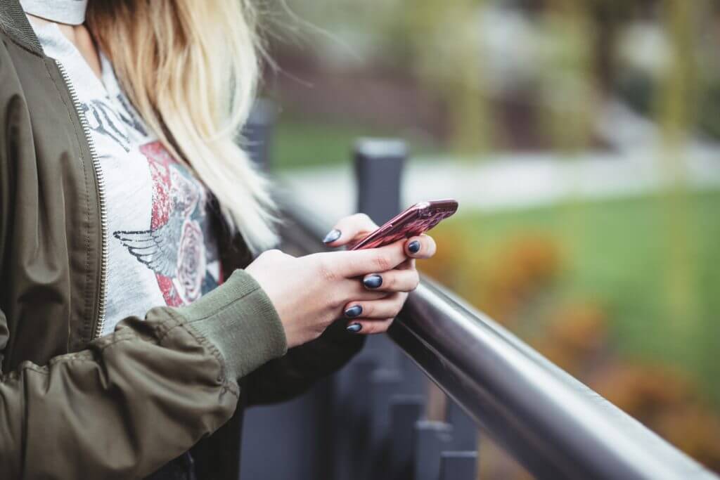 Woman texting on phone.