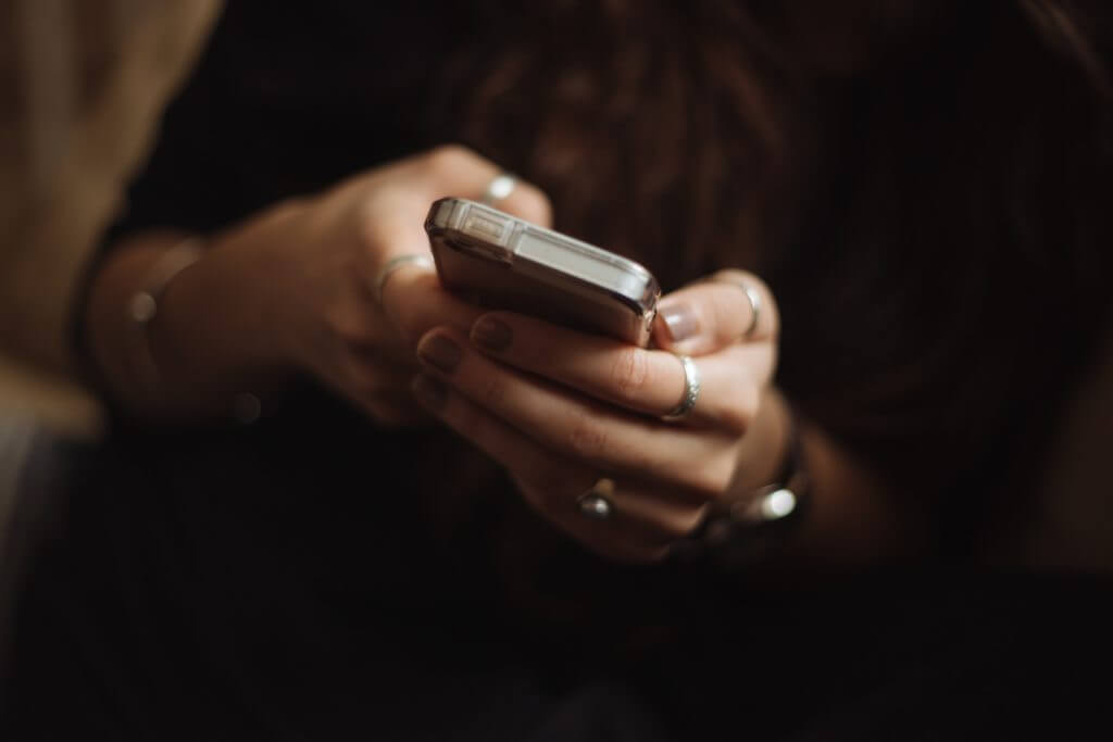 Person reading phone