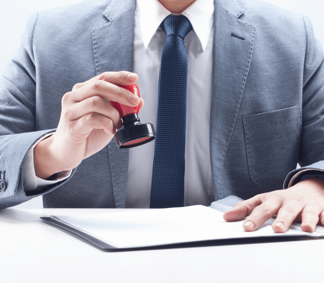 Lawyer stamping a confidential notice on paperwork