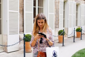 Woman texting from phone.