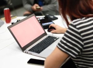 Woman working at computer.