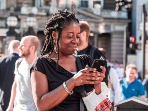 Woman using phone.