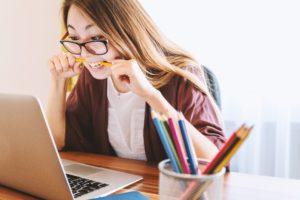 Business woman working at computer.