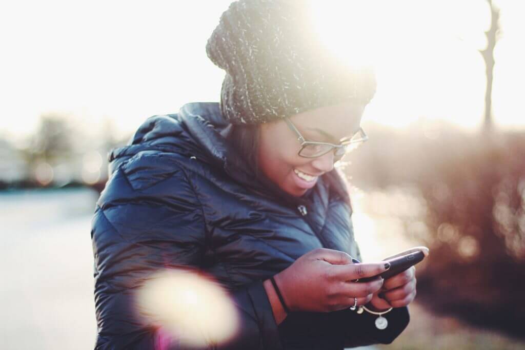 Woman texting on phone.