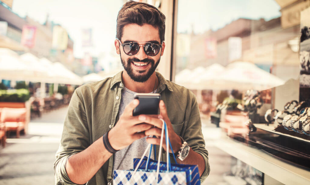 Person shopping and texting.