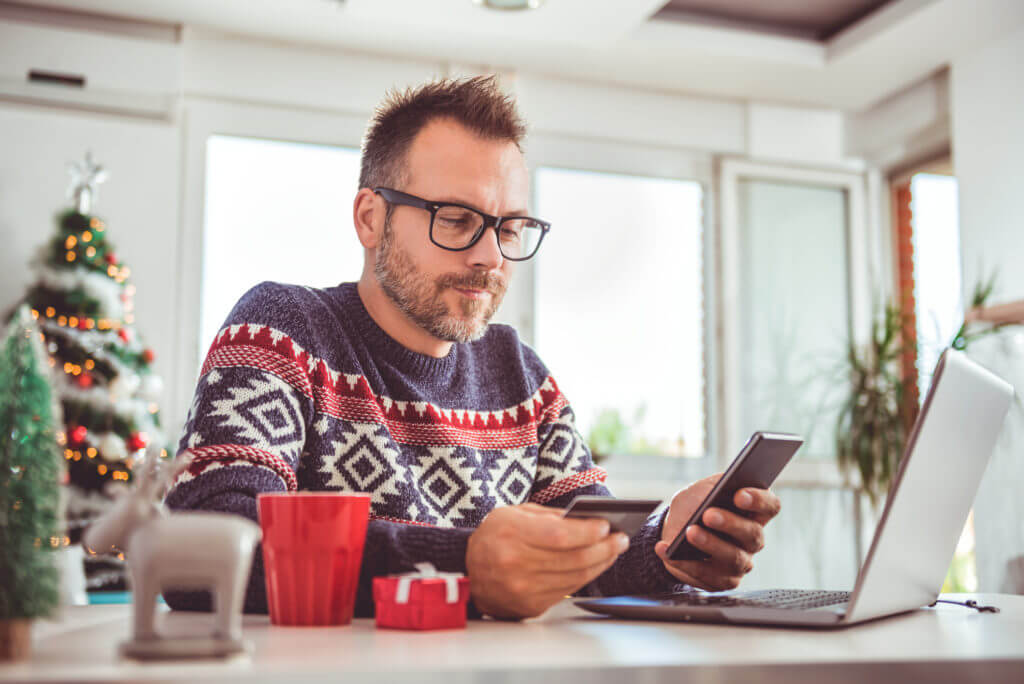 Man checking phone during holidays