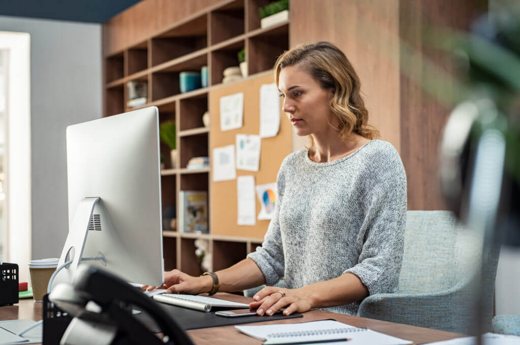 Businesswoman working at computer.