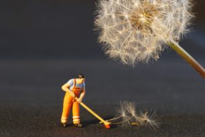 Figure of a man cleaning 