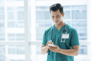 Person using SMS to scale hospital staff