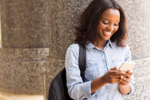 Prospective student using SMS for colleges to connect with current student