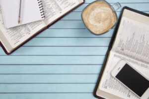 The Bible next to a phone 