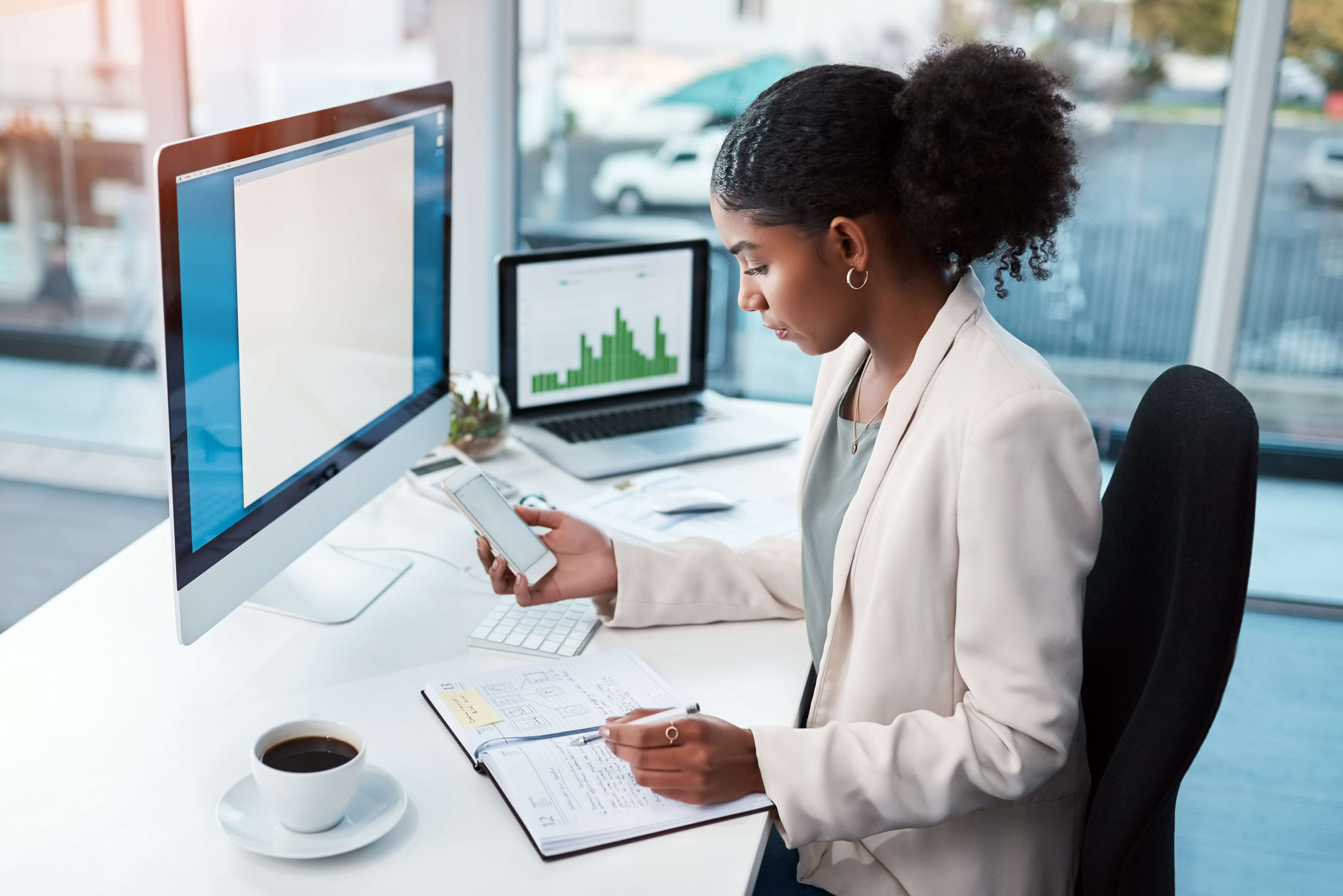 Woman using finance SMS desk