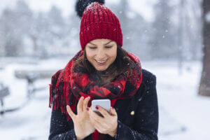 Woman receiving message sent from an SMS automation