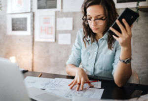 Woman strategizing technology company workflows