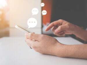 Woman replying to conversational customer engagement content
