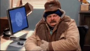 Gif of Ron Swanson frowning in winter coat