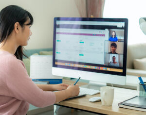 Woman attending online event