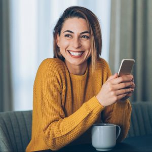 Woman texting using conversational customer engagement