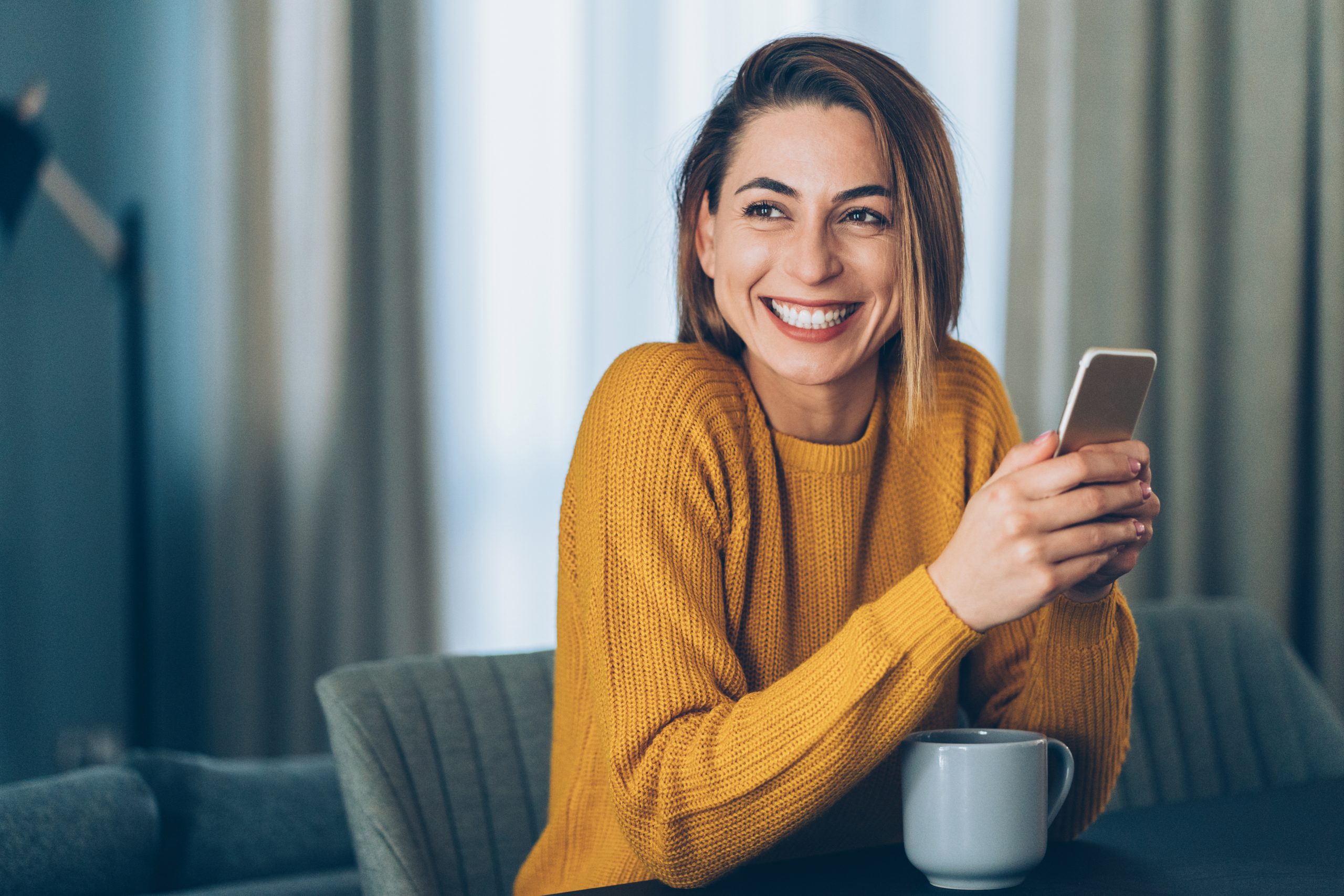 Woman texting using conversational customer engagement
