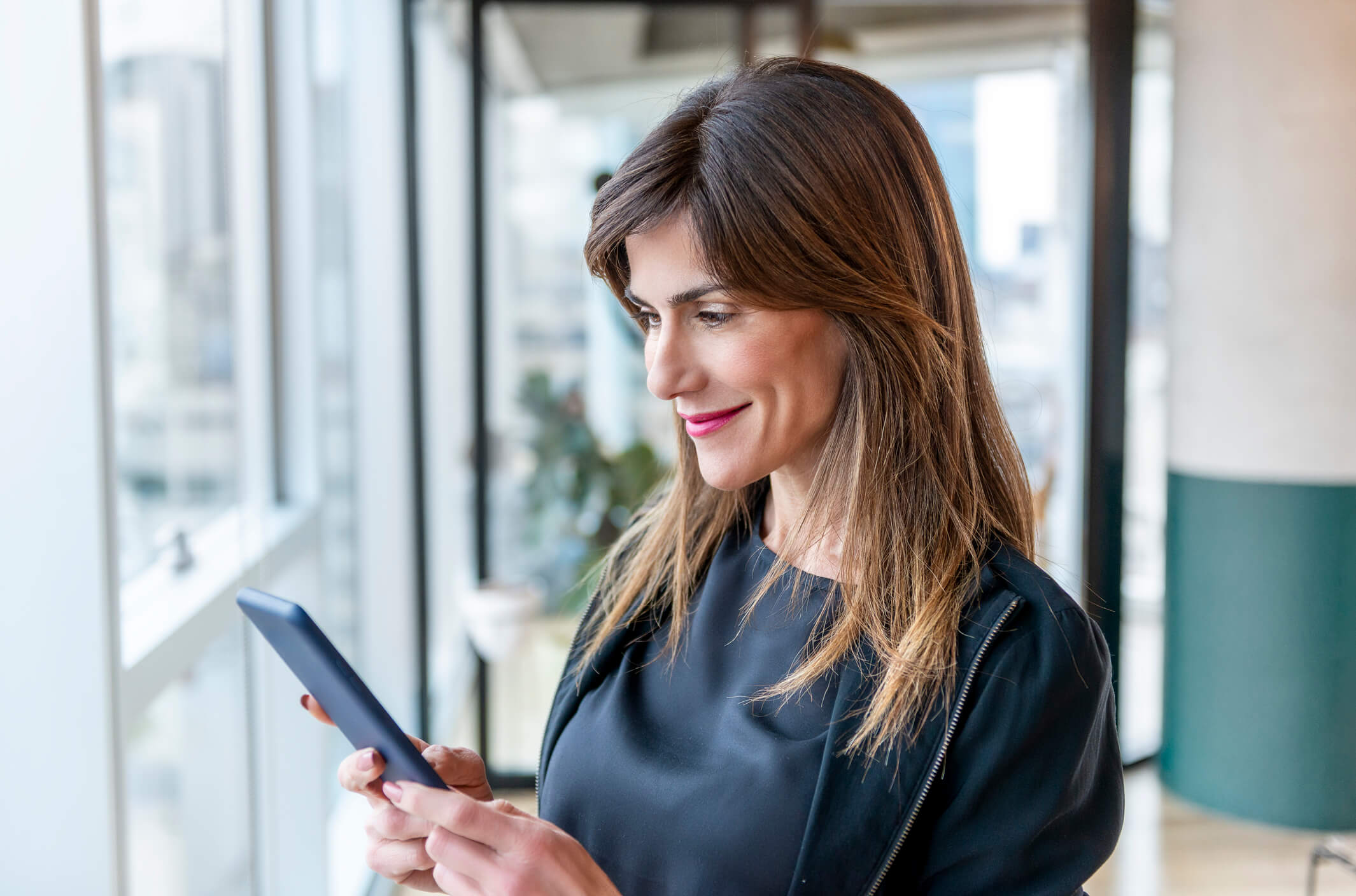 Woman using SMS templates for business