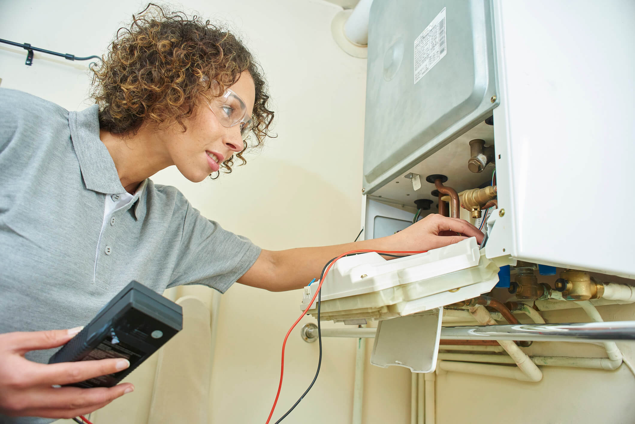 Electrician working on central heating