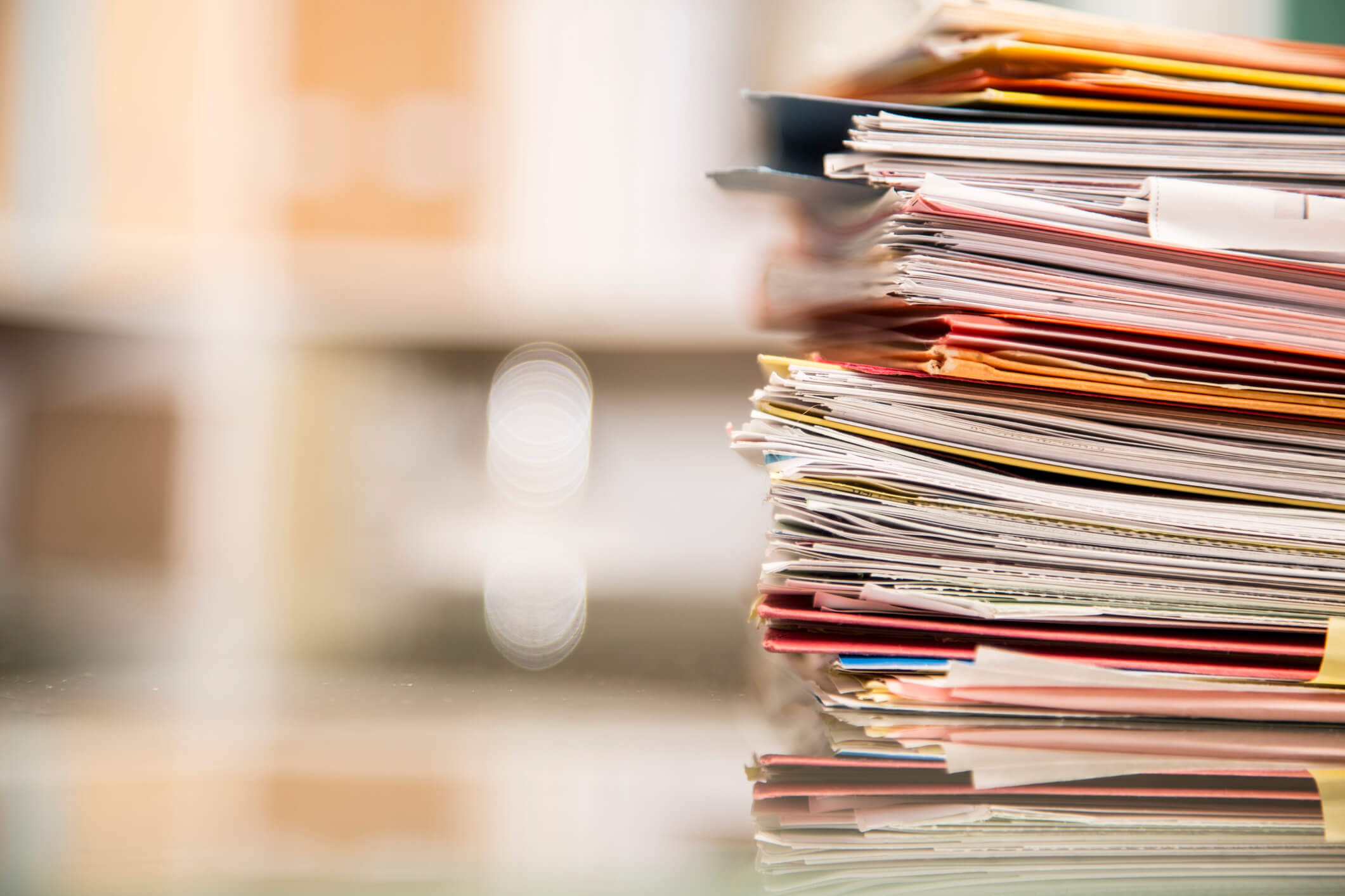 Stack of files on desk