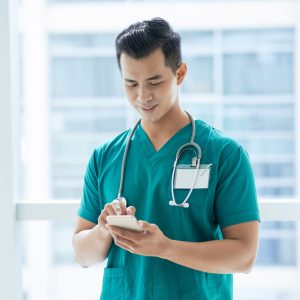 Doctor texting with SMS for healthcare