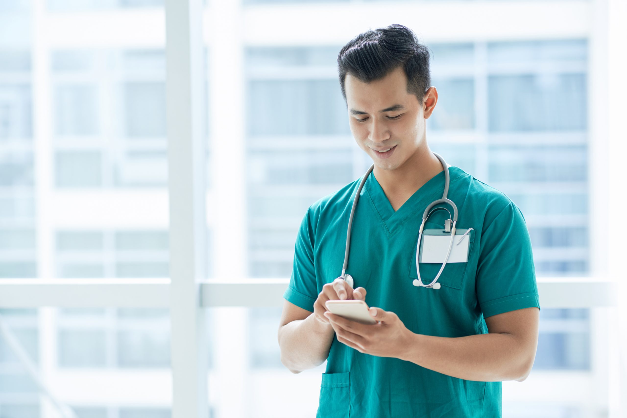 Doctor texting with SMS for healthcare