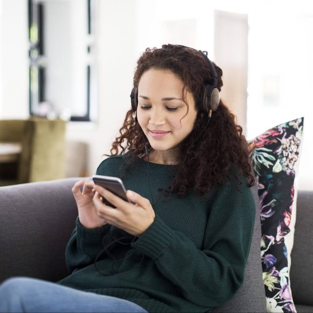 Woman texting using Conversational Customer Engagement