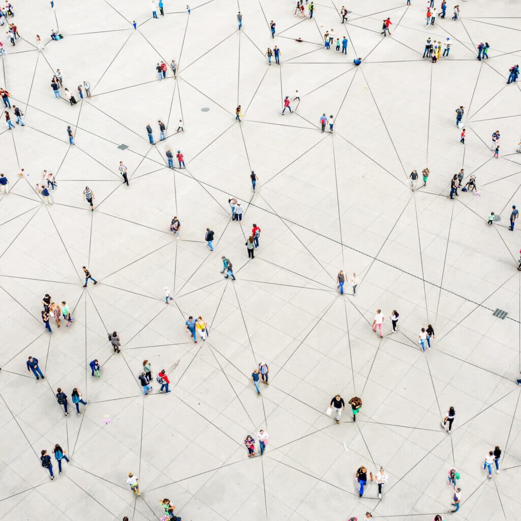 Aerial view of people connected by lines to signify the Zapier sms integration