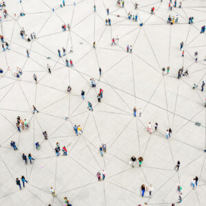 Aerial view of people connected by lines to signify the Zapier sms integration