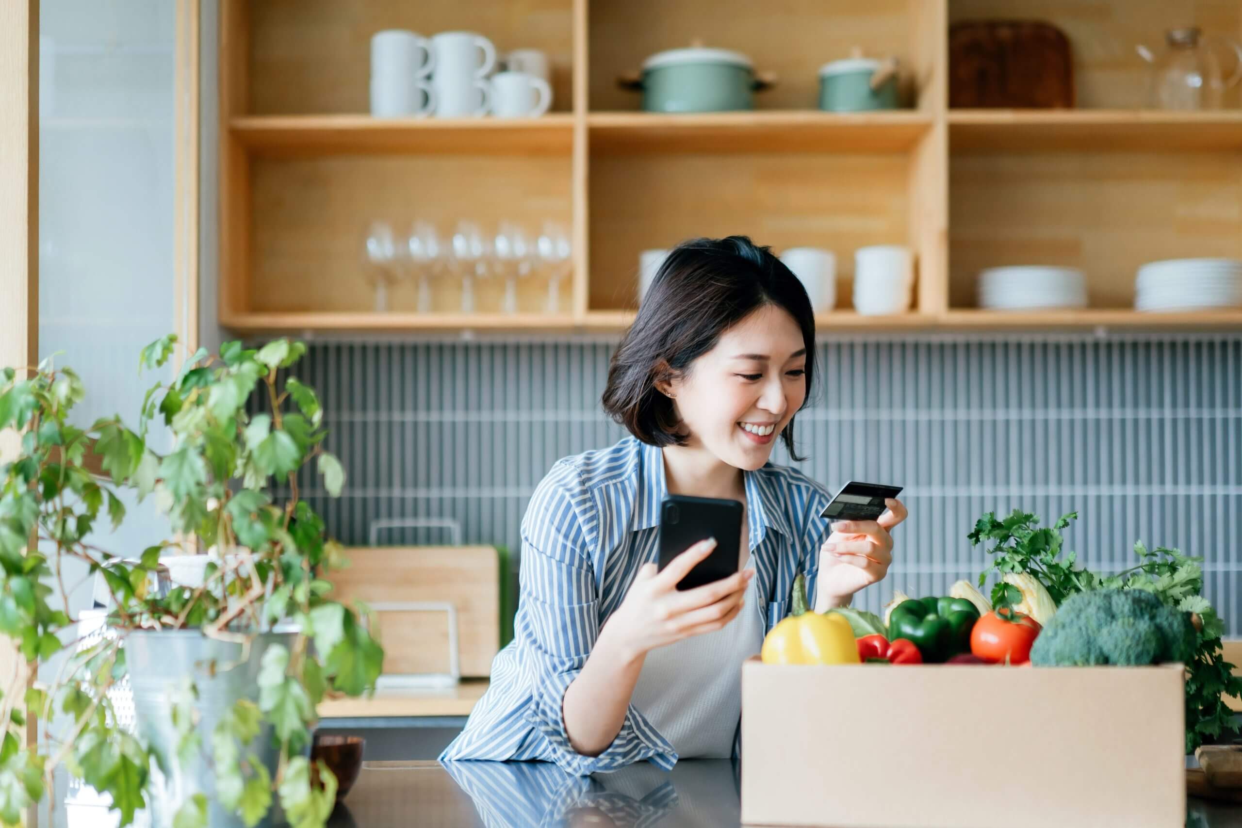 Woman shopping for groceries online