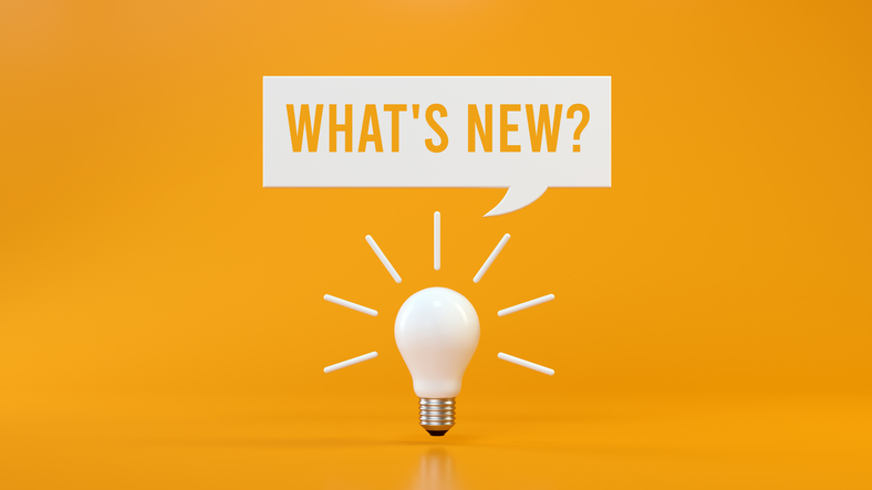 Lightbulb with what's new sign to show ecommerce customer engagement tools