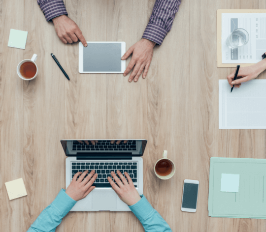 Professionals reading via different devices