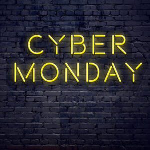 Text that reads cyber monday on a brick backdrop