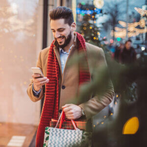 Man shopping and texting