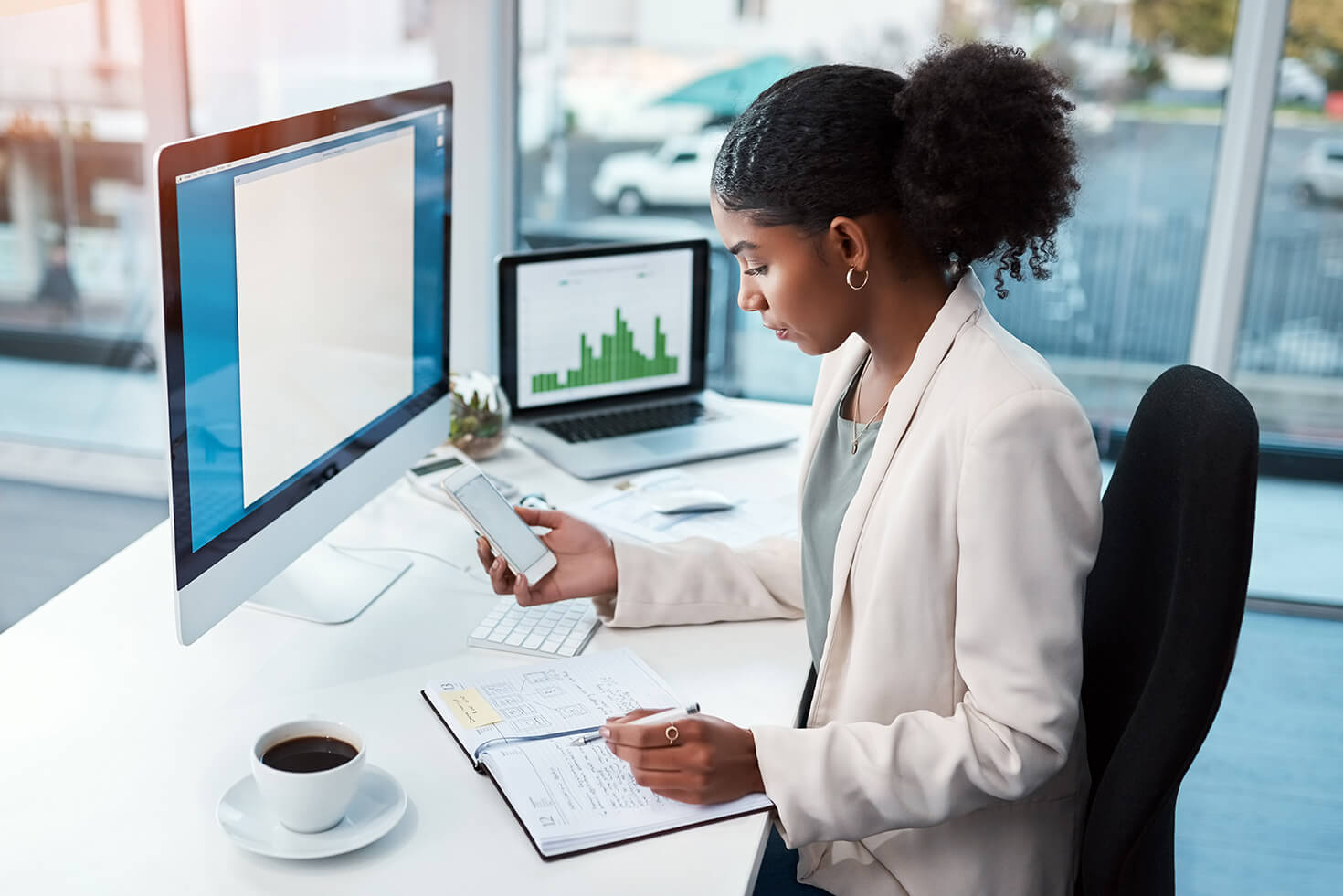 Woman using finance SMS desk