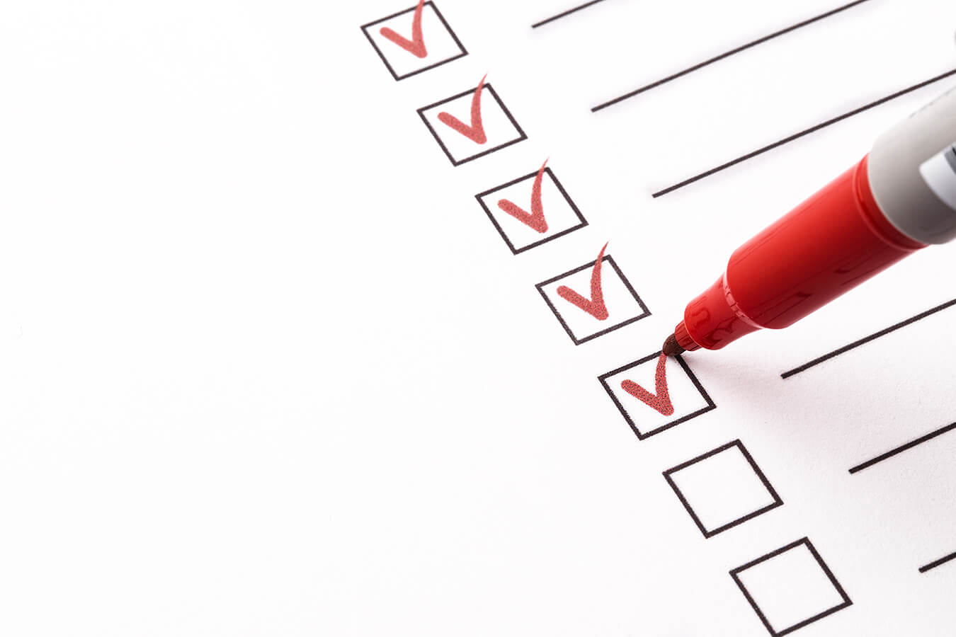 Checklist for improving client communications; checks marked in red ink