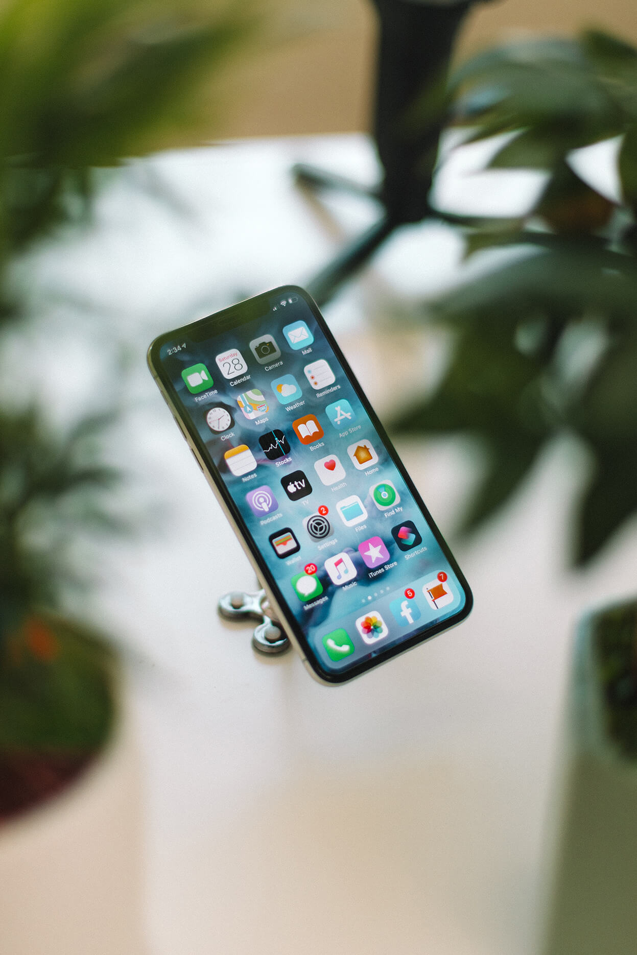 Phone displaying omnichannel messaging icons