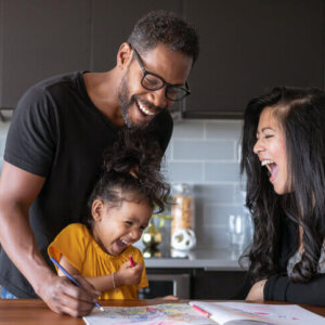 Family playing with baby