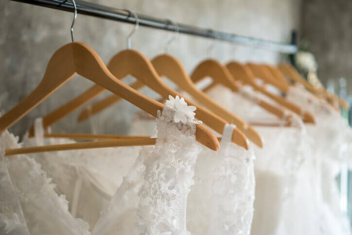 Bridal gowns on hangers